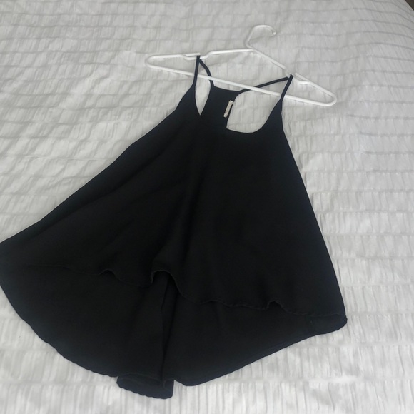 Tops - Black spaghetti strap light weight top that is longer in the back